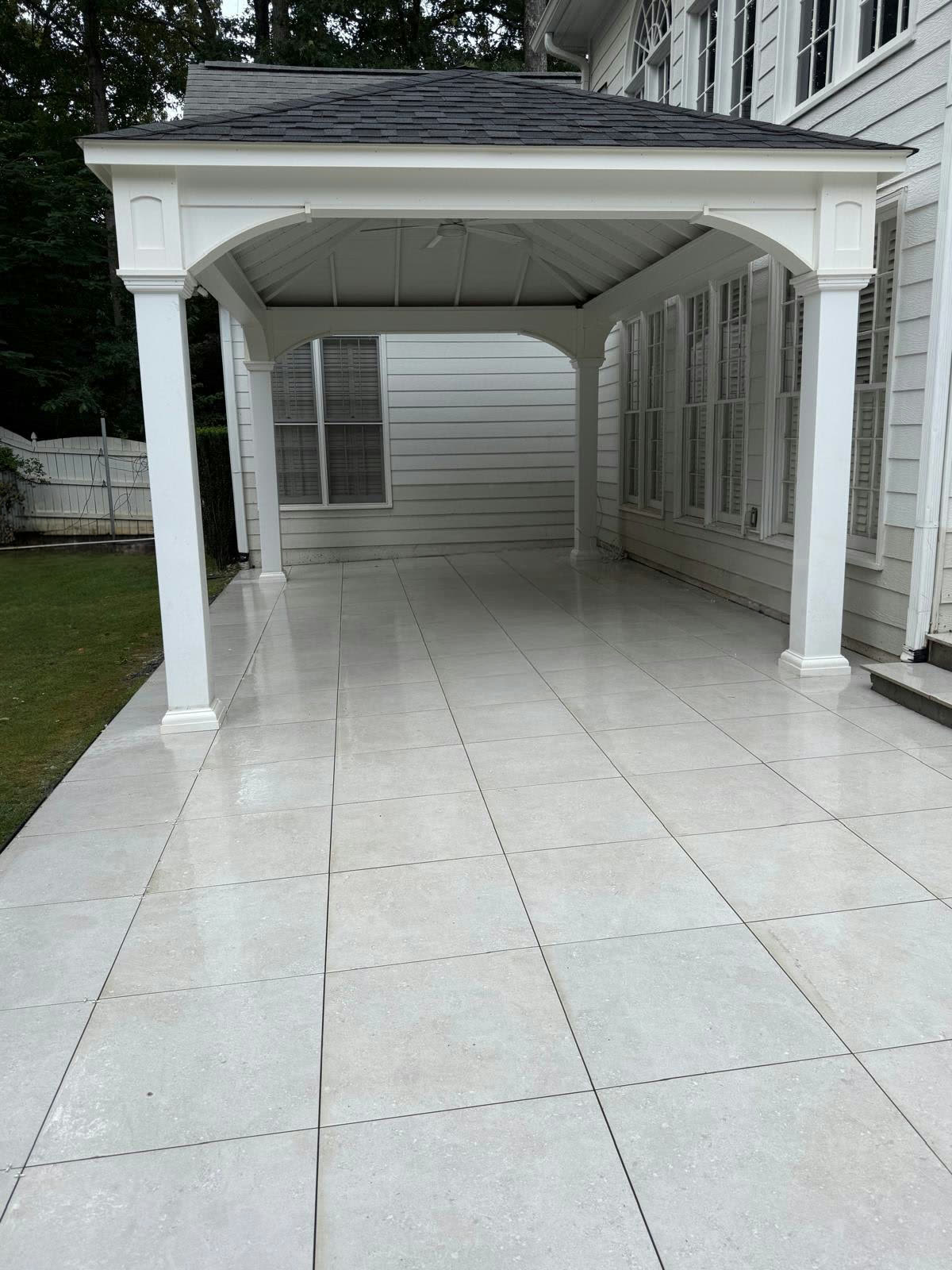 Why North Georgia Homeowners Are Pairing Covered Pavilions With Large-Format Paver Patios